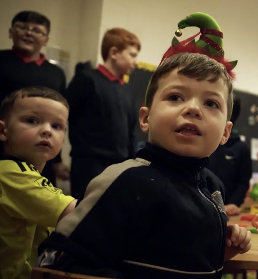Young children at an activity table