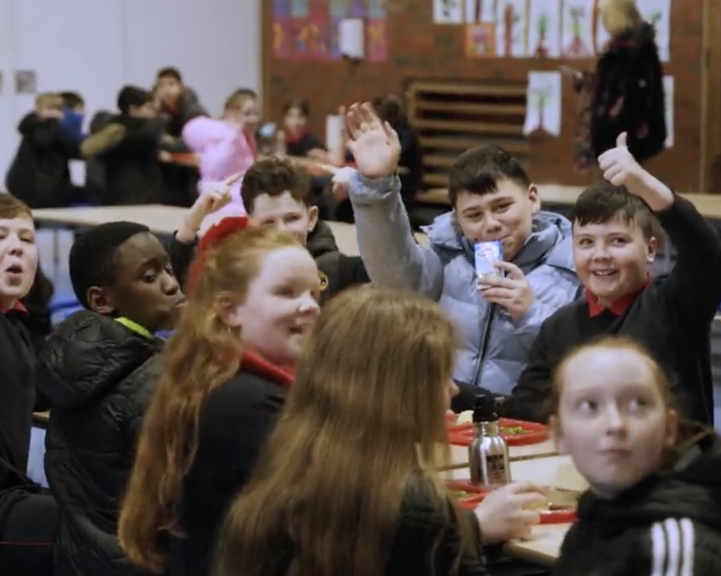 Happy children in the St Ultan's dining hall